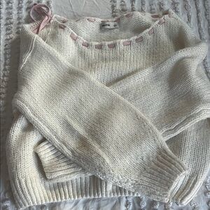 White Sweater with Pink Accents